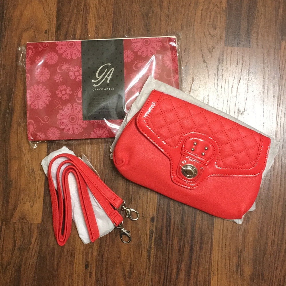 NIP Grace Adele Tate Clutch in Coral
